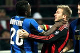 MILAN, ITALY - FEBRUARY 15:  Sulley Ali Muntari (L) and David Beckham (R) in action during FC Inter Milan v AC Milan - Serie A match on February 15, 2009 in Milan, Italy.  (Photo by Vittorio Zunino Celotto/Getty Images)
