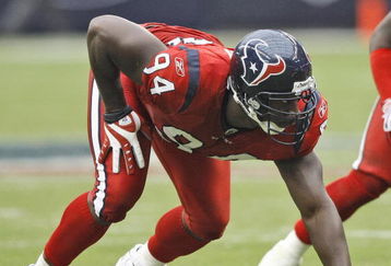 HOUSTON - SEPTEMBER 27:  Defensive end Antonio Smith #94 of the Houston Texans lines up during the game against the Jacksonville Jaguars  at Reliant Stadium on September 27, 2009 in Houston, Texas.  (Photo by Bob Levey/Getty Images)