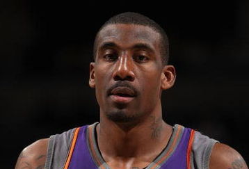MILWAUKEE - JANUARY 22:  Amare Stoudemire #1 of the Phoenix Suns looks against the Milwaukee Bucks at the Bradley Center on January 22, 2008 in Milwaukee, Wisconsin. The Suns won 114-105. NOTE TO USER: User expressly acknowledges and agrees that, by downloading and/or using this Photograph, user is consenting to the terms and conditions of the Getty Images License Agreement.  (Photo by Jonathan Daniel/Getty Images)