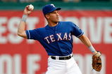 ARLINGTON, TX - JULY 31:   Omar Vizquel #13 of the Texas Rangers on July 31, 2009 at Rangers Ballpark in Arlington, Texas.  (Photo by Ronald Martinez/Getty Images)