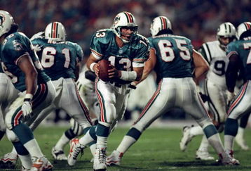 13 Dec 1998:  Dan Marino #13 of the Miami Dolphins turns after the snap during the game against the New York Jets at Pro Player Stadium in Miami, Florida. The Jets defeated the Dolphins 21-16. Mandatory Credit: Andy Lyons  /Allsport