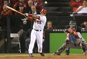 ANAHEIM, CA - OCTOBER 09:  Bobby Abreu #53 of the Los Angeles Angels of Anaheim hits a single against the Boston Red Sox in the eighth inning of Game Two of the ALDS during the 2009 MLB Playoffs at Angel Stadium on October 9, 2009 in Anaheim, California.  (Photo by Jacob de Golish/Getty Images)