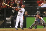 ANAHEIM, CA - OCTOBER 09:  Bobby Abreu #53 of the Los Angeles Angels of Anaheim hits a single against the Boston Red Sox in the eighth inning of Game Two of the ALDS during the 2009 MLB Playoffs at Angel Stadium on October 9, 2009 in Anaheim, California.  (Photo by Jacob de Golish/Getty Images)