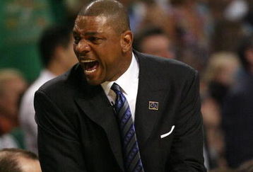 BOSTON - MAY 12:  Head coach Doc Rivers of the Boston Celtics celebrates the win over the Orlando Magic in Game Five of the Eastern Conference Semifinals during the 2009 NBA Playoffs at TD Banknorth Garden May 12, 2009 in Boston, Massachusetts. The Celtics defeated the Magic 92-88.  NOTE TO USER: User expressly acknowledges and agrees that, by downloading and or using this photograph, User is consenting to the terms and conditions of the Getty Images License Agreement.  (Photo by Elsa/Getty Images)