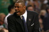 BOSTON - MAY 12:  Head coach Doc Rivers of the Boston Celtics celebrates the win over the Orlando Magic in Game Five of the Eastern Conference Semifinals during the 2009 NBA Playoffs at TD Banknorth Garden May 12, 2009 in Boston, Massachusetts. The Celtics defeated the Magic 92-88.  NOTE TO USER: User expressly acknowledges and agrees that, by downloading and or using this photograph, User is consenting to the terms and conditions of the Getty Images License Agreement.  (Photo by Elsa/Getty Images)