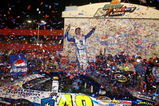 FONTANA, CA - AUGUST 31:  Jimmie Johnson, driver of the #48 Lowe's/Jimmie Johnson Foundation Chevrolet, celebrates in victory lane after winning the NASCAR Sprint Cup Series Pepsi 500 at Auto Club Speedway on August 31, 2008 in Fontana, California.  (Photo by Jonathan Moore/Getty Images for NASCAR)