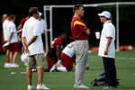 ASHBURN, VA - JULY 30:  Washington Redskins Head Coach Jim Zorn (C) talks with owner Daniel Snyder (R) as Executive Vice President for Football Operations Vinny Cerrato (L) looks on during the first day of training camp July 30, 2009 in Ashburn, Virginia.  (Photo by Win McNamee/Getty Images)