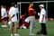 ASHBURN, VA - JULY 30:  Washington Redskins Head Coach Jim Zorn (C) talks with owner Daniel Snyder (R) as Executive Vice President for Football Operations Vinny Cerrato (L) looks on during the first day of training camp July 30, 2009 in Ashburn, Virginia.  (Photo by Win McNamee/Getty Images)