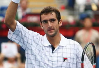 BEIJING - OCTOBER 10:   Marin Cilic of Croatia celebrates winning against Rafael Nadal of Spain in the Semifinals during day nine of the 2009 China Open at the National Tennis Centre on October 10, 2009 in Beijing, China.  (Photo by Feng Li/Getty Images)
