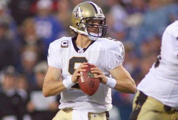 ORCHARD PARK, NY - SEPTEMBER 27:  Quarterback Drew Brees #9 of the New Orleans Saints moves to pass the ball during the game against the Buffalo Bills at Ralph Wilson Stadium on September 27, 2009 in Orchard Park, New York. The Saints won 27-7. (Photo by Rick Stewart/Getty Images)