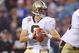ORCHARD PARK, NY - SEPTEMBER 27:  Quarterback Drew Brees #9 of the New Orleans Saints moves to pass the ball during the game against the Buffalo Bills at Ralph Wilson Stadium on September 27, 2009 in Orchard Park, New York. The Saints won 27-7. (Photo by Rick Stewart/Getty Images)