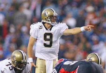 ORCHARD PARK, NY - SEPTEMBER 27:  Quarterback Drew Brees #9 of the New Orleans Saints calls the play during the game against the Buffalo Bills at Ralph Wilson Stadium on September 27, 2009 in Orchard Park, New York. The Saints won 27-7. (Photo by Rick Stewart/Getty Images)