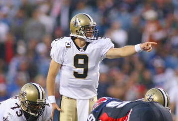 ORCHARD PARK, NY - SEPTEMBER 27:  Quarterback Drew Brees #9 of the New Orleans Saints calls the play during the game against the Buffalo Bills at Ralph Wilson Stadium on September 27, 2009 in Orchard Park, New York. The Saints won 27-7. (Photo by Rick Stewart/Getty Images)