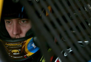FONTANA, CA - OCTOBER 10:  Kyle Busch, driver of the #18 M&M's Toyota, waits in his car during practice for the NASCAR Sprint Cup Series Pepsi 500 at Auto Club Speedway on October 10, 2009 in Fontana, California.  (Photo by Todd Warshaw/Getty Images)