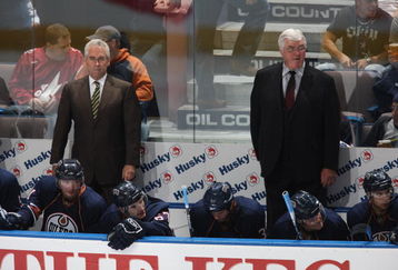EDMONTON, CANADA - SEPTEMBER 23:  Associate coach Tom Renney and head coach Pat Quinn of the Edmonton Oilers look on during the game against the Calgary Flames on September 23, 2009 at Rexall Place in Edmonton, Alberta, Canada. (Photo by Dale MacMillan/Getty Images)