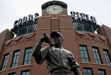 DENVER - OCTOBER 10:  The statue of 'The Player' is dusted with snow outside the stadium as Game 3 of the National League Division series between the Philadelphia Phillies and the Colorado Rockies at Coors Field has been postponed due to inclement weather on October 10, 2009 in Denver, Colorado. Light snow covered the field and sub freezing temperatures are predicted for game time so Game 3 has been rescheduled to be played at Coors Field on Sunday October 11, 2009.  (Photo by Doug Pensinger/Getty Images)
