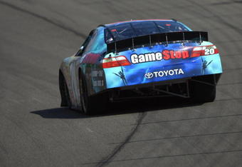 FONTANA, CA - OCTOBER 10:  Joey Logano, driver of the #20 GameStop/Brutal Legend Toyota, races during the NASCAR Nationwide Series Copart 300 at Auto Club Speedway on October 10, 2009 in Fontana, California.  (Photo by Jason Smith/Getty Images for NASCAR)