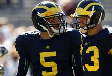 ANN ARBOR, MI - SEPTEMBER 19:  Quarterback Tate Forcier #5 of the Michigan Wolverines warms up for the game against the Eastern Michigan Eagles at Michigan Stadium on September 19, 2009 in Ann Arbor, Michigan.  Michigan won 45-17.  (Photo by Stephen Dunn/Getty Images)