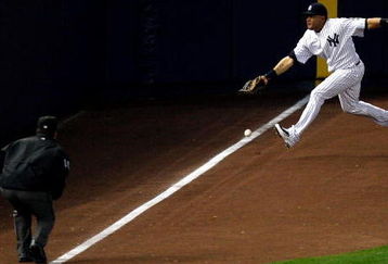 NEW YORK - OCTOBER 09:  Melky Cabrera #53 of the New York Yankees fails to make a play on a ball that lands fair but is called foul by umpire Phil Cuzzi in the eleventh inning agains against the Minnesota Twins in Game Two of the ALDS during the 2009 MLB Playoffs at Yankee Stadium on October 9, 2009 in the Bronx borough of New York City.  (Photo by Jared Wickerham/Getty Images)