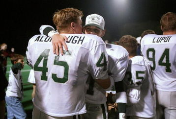 7 Nov 1997: Justin Alumbaugh and Cort Golighty of De La Salle hug each other during a game against College Park at Diablo Valley College in Pleasant Hill, California. De La Salle won the game 56-0 and was De La Salle''s record-breaking 73rd straight victor