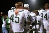 7 Nov 1997: Justin Alumbaugh and Cort Golighty of De La Salle hug each other during a game against College Park at Diablo Valley College in Pleasant Hill, California. De La Salle won the game 56-0 and was De La Salle''s record-breaking 73rd straight victor