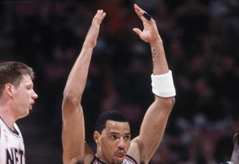 14 Jan 2002:  Forward Kenyon Martin #6 of the New Jersey Nets celebrates during the NBA game against the San Antonio Spurs at the Continental Airlines Arena in East Rutherford, New Jersey.  The Nets defeated the Spurs 99-97.  Mandatory Credit:  Jamie Squire/Getty Images