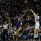 SAN ANTONIO - JANUARY 14:  Manu Ginobili #20 of the San Antonio Spurs takes a shot against Josh Powell #21 of the Los Angeles Lakers on January 14, 2009 at AT&T Center in San Antonio, Texas.  NOTE TO USER: User expressly acknowledges and agrees that, by downloading and/or using this Photograph, user is consenting to the terms and conditions of the Getty Images License Agreement.  (Photo by Ronald Martinez/Getty Images)