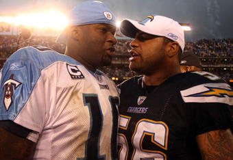 SAN DIEGO - JANUARY 06:  Shawne Merriman #56 of the San Diego Chargers meets Quarterback Vince Young #10 of the Tennessee Titans en route to the Chargers' 17-6 victory over the Titans during their AFC Wild Card Game on January 6, 2008 at Qualcomm Stadium in San Diego, California.  (Photo by Donald Miralle/Getty Images)  