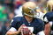 SOUTH BEND, IN - OCTOBER 03: Jimmy Clausen #7 of the Notre Dame Fighting Irish looks for a receiver against the Washington Huskies on October 3, 2009 at Notre Dame Stadium in South Bend, Indiana. Notre Dame defeated Washington 37-30 in overtime. (Photo by Jonathan Daniel/Getty Images)