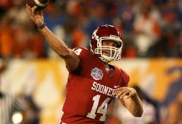 MIAMI - JANUARY 08:  Sam Bradford #14 of the Oklahoma Sooners warm-ups against the Florida Gators during the FedEx BCS National Championship game at Dolphin Stadium on January 8, 2009 in Miami, Florida.  (Photo by Doug Benc/Getty Images)