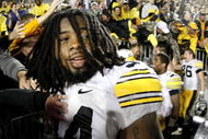 STATE COLLEGE, PA - SEPTEMBER 26:  Adrian Clayborn #94 of the Iowa Hawkeyes celebrates a 21-10 victory over the Penn State Nittnay Lions on September 26, 2009 at Beaver Stadium in State College, Pennsylvania.  (Photo by Gregory Shamus/Getty Images)