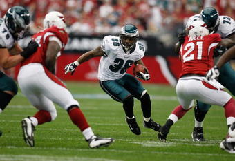 GLENDALE, AZ - JANUARY 18:  Running back Brian Westbrook #36 of the Philadelphia Eagles rushes against the Arizona Cardinals during the NFC championship game on January 18, 2009 at University of Phoenix Stadium in Glendale, Arizona.  (Photo by Chris Graythen/Getty Images)