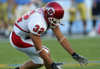 PASADENA, CA - SEPTEMBER 02:  Eric Weddle #32 of the Utah Utes dives for a loose ball against the UCLA Bruins during the college football game held on Septemeber 2, 2006 at the Rose Bowl in Pasadena, California. The Bruins defeated the Utes 31-10. The Bruins defeated the Utes 31-10.  (Photo by Stephen Dunn/Getty Images)