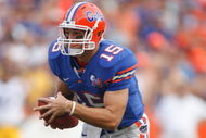 GAINESVILLE, FL - OCTOBER 7:  Quarterback Tim Tebow #15 of the Florida Gators runs with the ball during the game against the LSU Tigers at Ben Hill Griffin Stadium on October 7, 2006 in Gainesville, Florida. Florida won 23-10.  (Photo by Marc Serota/Getty Images)