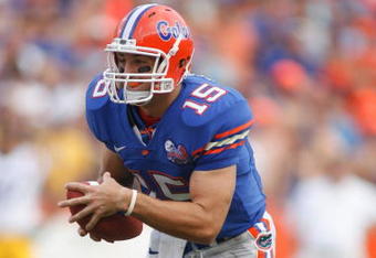 GAINESVILLE, FL - OCTOBER 7:  Quarterback Tim Tebow #15 of the Florida Gators runs with the ball during the game against the LSU Tigers at Ben Hill Griffin Stadium on October 7, 2006 in Gainesville, Florida. Florida won 23-10.  (Photo by Marc Serota/Getty Images)