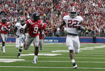 OXFORD, MS - OCTOBER 10:  Mark Ingram #22 of the Alabama Crimson Tide runs for a 36-yard touchdown as Allen Walker #9 of the Mississippi Rebels pursues at Vaught-Hemingway Stadium on October 10, 2009 in Oxford, Mississippi. (Photo by Dave Martin/Getty Images)