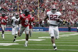 OXFORD, MS - OCTOBER 10:  Mark Ingram #22 of the Alabama Crimson Tide runs for a 36-yard touchdown as Allen Walker #9 of the Mississippi Rebels pursues at Vaught-Hemingway Stadium on October 10, 2009 in Oxford, Mississippi. (Photo by Dave Martin/Getty Images)
