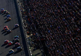 DAYTONA, FL - FEBRUARY 18:  A view of cars racing on the track, during the NASCAR Nextel Cup Series Daytona 500 at Daytona International Speedway on February 18, 2007 in Daytona, Florida.  (Photo by Jamie Squire/Getty Images for NASCAR)