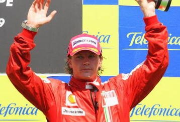 VALENCIA, SPAIN - AUGUST 23:  Kimi Raikkonen of Finland and Ferrari celebrates on the podium after finishing third in the European Formula One Grand Prix at the Valencia Street Circuit on August 23, 2009, in Valencia, Spain.  (Photo by Mark Thompson/Getty Images)