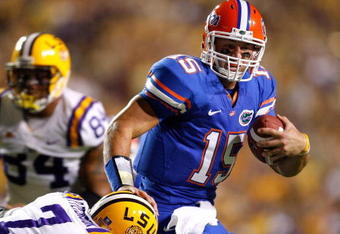 BATON ROUGE, LA - OCTOBER 10:  Patrick Peterson #7 of the Louisiana State University Tigers tackles quarterback Tim Tebow #15 of the Florida Gators at Tiger Stadium on October 10, 2009 in Baton Rouge, Louisiana.  (Photo by Kevin C. Cox/Getty Images)