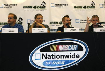 SPARTA, KY - JUNE 12:  (L-R) Jason Keller, driver of the #27 Cottonelle/Meijer Ford, Stephen Leicht, driver of the #29 Holiday Inn Chevrolet, Jason Leffler, driver of the #38 Great Clips Toyota and Justin Allgaier, driver of the #12 Verizon Wireless Dodge talk about the Nationwide 'Dash 4 Cash' program before practicing for the Meijer 300 Nationwide Series race at the Kentucky Speedway on June 12, 2009 in Sparta, Kentucky.  (Photo by John Sommers II/Getty Images)