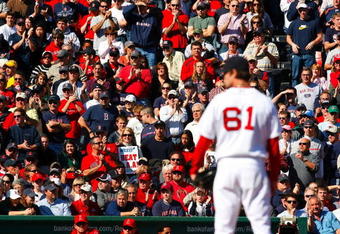 BOSTON - OCTOBER 11:  Starting pitcher Clay Buchholz #61 of the Boston Red Sox on the mound in the first inning against the Los Angeles Angels of Anaheim in Game Three of the ALDS during the 2009 MLB Playoffs at Fenway Park on October 11, 2009 in Boston, Massachusetts. (Photo by Jim Rogash/Getty Images)