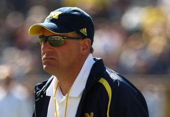 ANN ARBOR, MI - SEPTEMBER 19:  Head coach Rich Rodriguez of the Michigan Wolverines watches warmups before the game with the Eastern Michigan Eagles at Michigan Stadium on September 19, 2009 in Ann Arbor, Michigan.  Michigan won 45-17.  (Photo by Stephen Dunn/Getty Images)