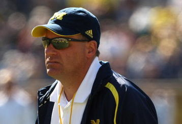 ANN ARBOR, MI - SEPTEMBER 19:  Head coach Rich Rodriguez of the Michigan Wolverines watches warmups before the game with the Eastern Michigan Eagles at Michigan Stadium on September 19, 2009 in Ann Arbor, Michigan.  Michigan won 45-17.  (Photo by Stephen Dunn/Getty Images)