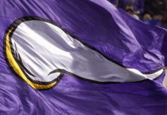 MINNEAPOLIS - AUGUST 25:  Flag runners of the Minnesota Vikings run up field against the Baltimore Ravens on August 25, 2006 at the H.H.H. Metrodome in Minneapolis, Minnesota. (Photo by David Sherman/Getty Images)