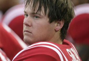 OXFORD, MS - OCTOBER 10:  Quarterback Jevan Snead #4 of the Mississippi Rebels sits quietly on the sideline at the end of a 22-3 loss to the Alabama Crimson Tide in their college football game at Vaught-Hemingway Stadium on October 10, 2009 in Oxford, Mississippi. (Photo by Dave Martin/Getty Images)