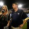 ATLANTA - SEPTEMBER 10:  ESPN sportscaster Erin Andrews (L) interviews head coach Paul Johnson of the Georgia Tech Yellow Jackets after their 30-27 over the Clemson Tigers at Bobby Dodd Stadium on September 10, 2009 in Atlanta, Georgia.  (Photo by Kevin C. Cox/Getty Images)