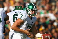 SOUTH BEND, IN - SEPTEMBER 19: Keith Nichol #7 of the Michigan State Spartans turns to hand off against the Notre Dame Fighting Irish on September 19, 2009 at Notre Dame Stadium in South Bend, Indiana. Notre Dame defeated Michigan State 33-30. (Photo by Jonathan Daniel/Getty Images)