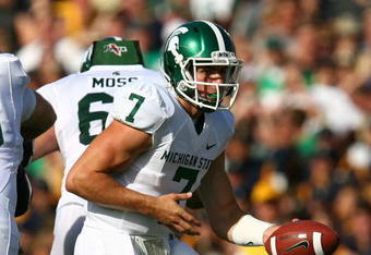 SOUTH BEND, IN - SEPTEMBER 19: Keith Nichol #7 of the Michigan State Spartans turns to hand off against the Notre Dame Fighting Irish on September 19, 2009 at Notre Dame Stadium in South Bend, Indiana. Notre Dame defeated Michigan State 33-30. (Photo by Jonathan Daniel/Getty Images)