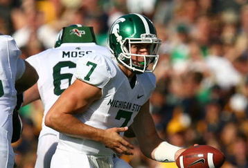SOUTH BEND, IN - SEPTEMBER 19: Keith Nichol #7 of the Michigan State Spartans turns to hand off against the Notre Dame Fighting Irish on September 19, 2009 at Notre Dame Stadium in South Bend, Indiana. Notre Dame defeated Michigan State 33-30. (Photo by Jonathan Daniel/Getty Images)